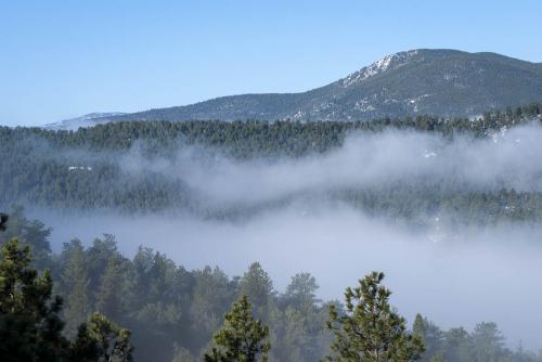 fog filling in to squaw peak